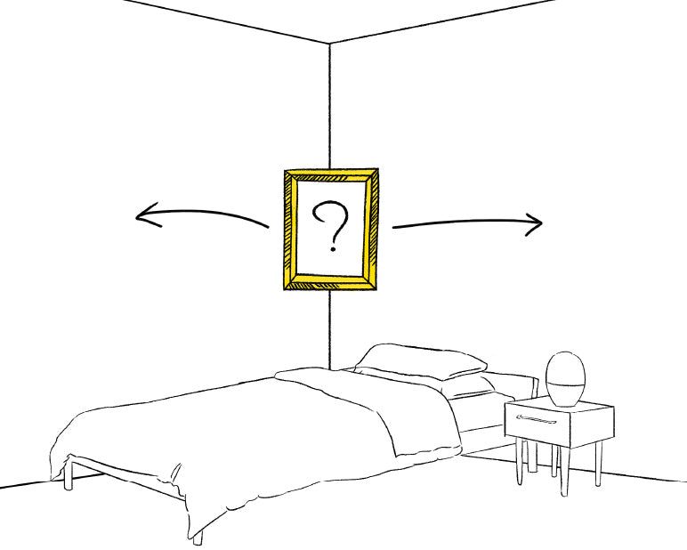 "My bed is in a corner of the room - where do I hang my artwork?"